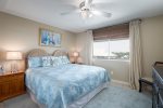Master bedroom with queen bed, large flat screen TV and beach views